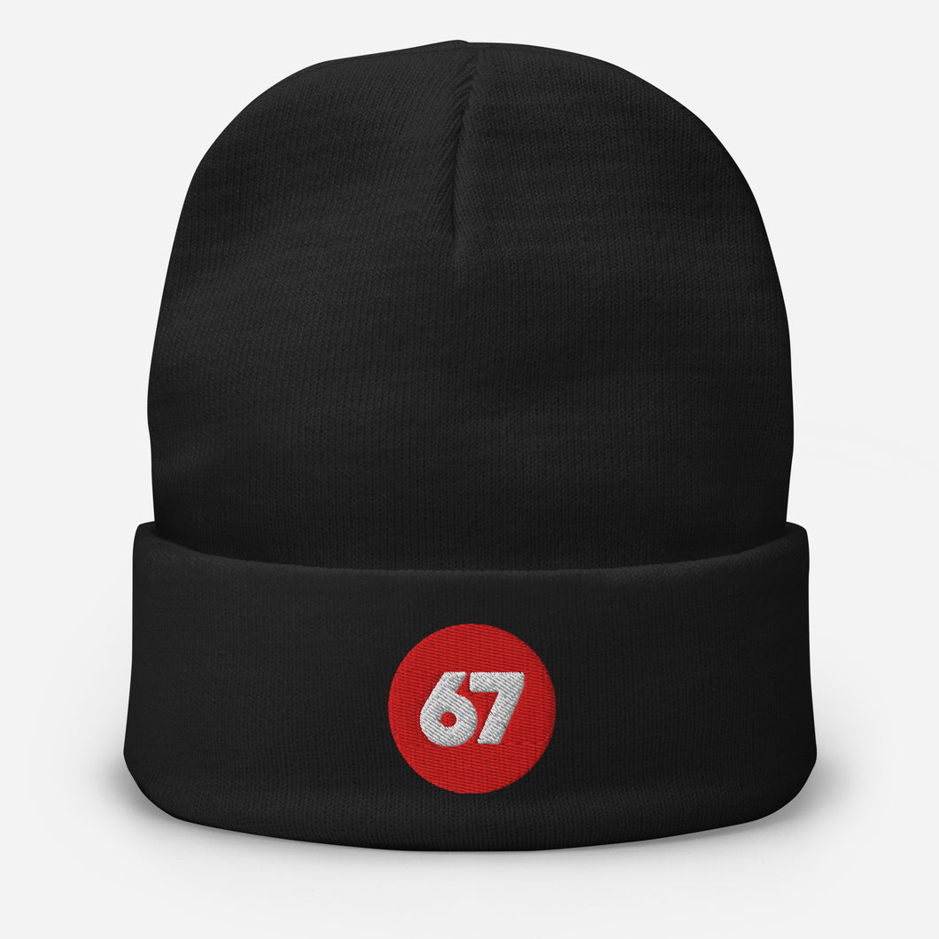 Black beanie with a red circle featuring the number 67 on a white background